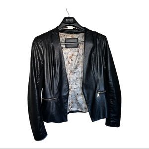 SOLD Women’s faux leather jacket with zippers